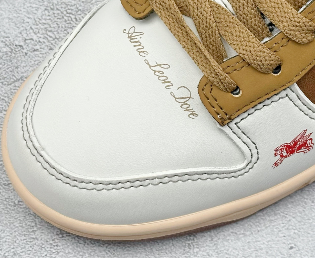 Nike Dunk Low x Porsche Aime Leon Dore