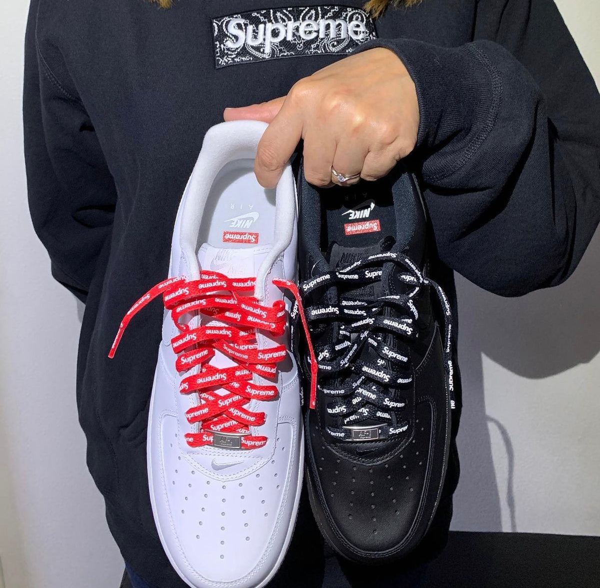 Red shoes with black laces on sale